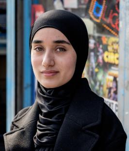 Portrait of a young woman wearing a hijab.