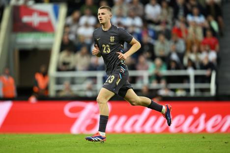 Adam Wharton of England's national team running on the field.