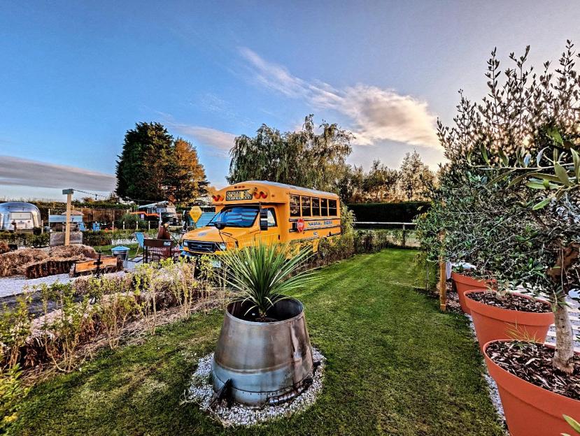 The English glampsite where you can sleep in an American school bus and fire engine – with new aircraft stay too
