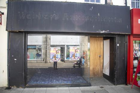 Empty commercial property on a high street.