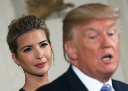 President Donald Trump speaking, with Ivanka Trump listening.