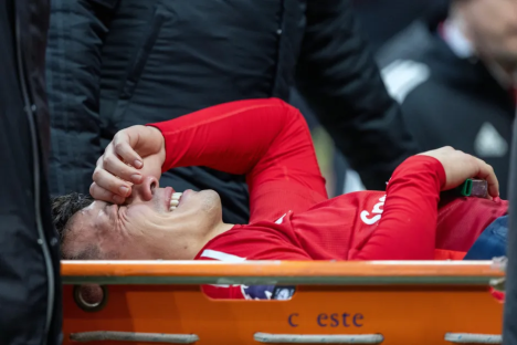 Injured soccer player on a stretcher.