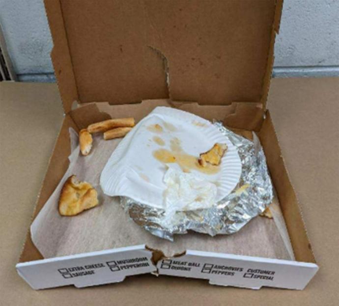 A pizza box which was tested for DNA evidence appears as part of a bail application regarding Gilgo Beach murder suspect Rex A. Heuermann by the Suffolk County District Attorney's office in an undated photo released July 14, 2023. Suffolk County Court/Handout via REUTERS THIS IMAGE HAS BEEN SUPPLIED BY A THIRD PARTY.