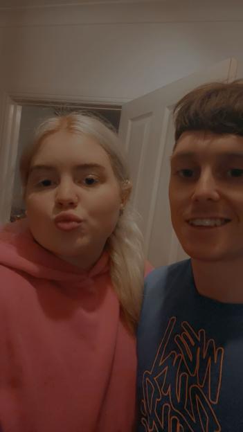 Photo of a young woman and man.