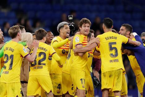 FC Barcelona players celebrating a La Liga victory.