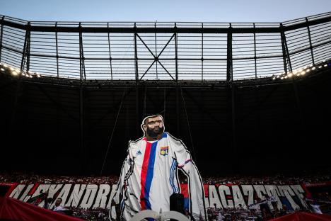 Tifo of Alexandre Lacazette at a soccer match.