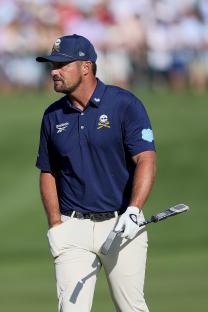 Bryson DeChambeau on a golf course.