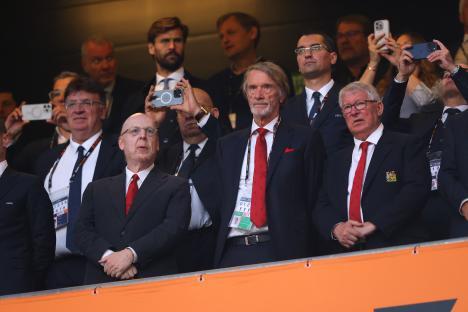 Avram Glazer and other Manchester United officials in the stands at a UEFA Europa League Final.