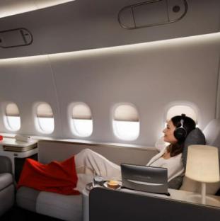 Air France Premier Suite passenger relaxing.
