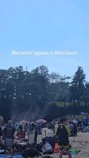 Watch moment twister forms on popular British beach as sunbathers watch in shock as their items are thrown into the air