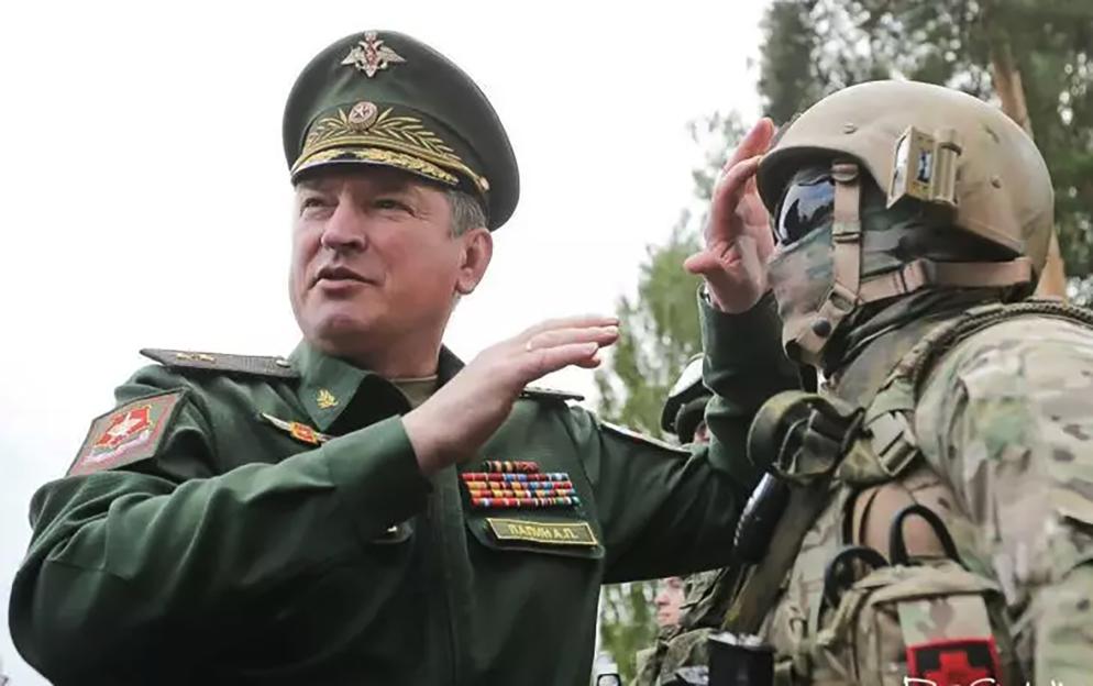 Colonel General Alexander Lapin, a Russian commander, talking to a soldier.