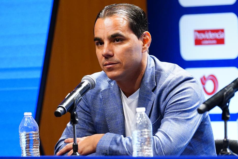 Omar Bravo speaks with the media at a press conference.