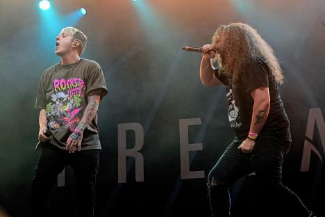 Brian Burkheiser and Eric Vanlerberghe of I Prevail performing at Pinkpop Festival.
