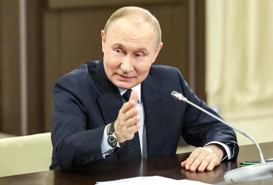 Russian President Vladimir Putin at a meeting with political party leaders.