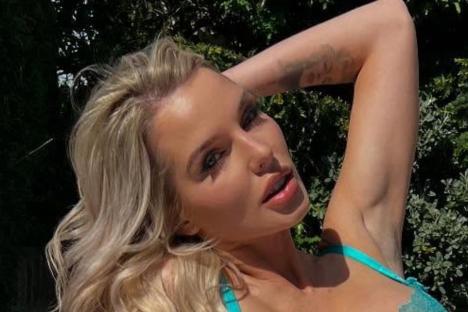 Helen Flanagan looks stunning as she strips off to lace lingerie, stockings and suspenders