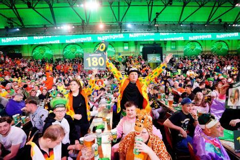 Darts fans in fancy dress at a World Darts Championship.