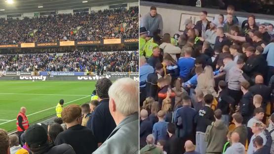 Police forced to intervene as Leicester fans fight EACH OTHER during hammering at Wolves