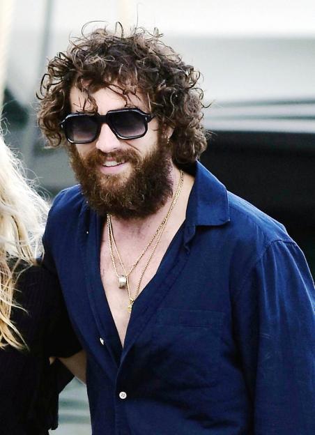 Aaron Taylor-Johnson leaving Elton John's yacht.