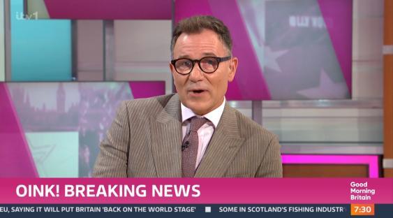 News anchor reporting on Peppa Pig's new baby.