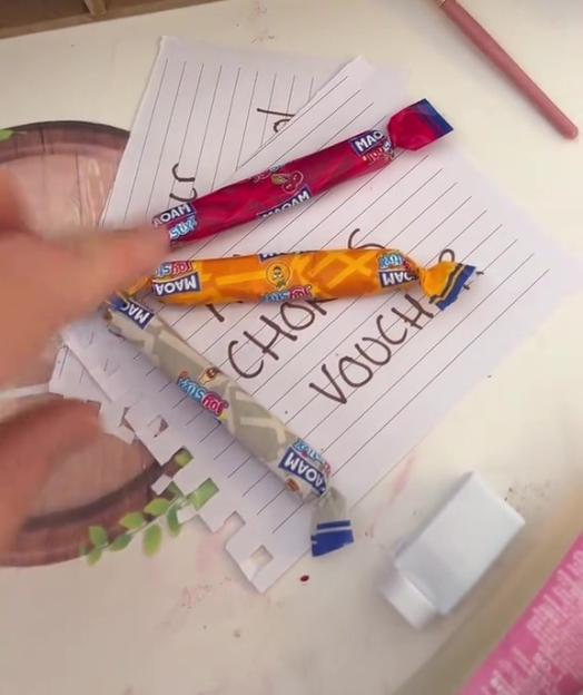 Candy used as a reward for tidying up.