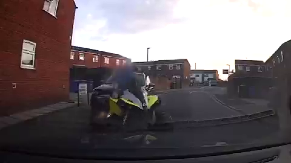 Dashcam footage of a quad bike ramming a police car.