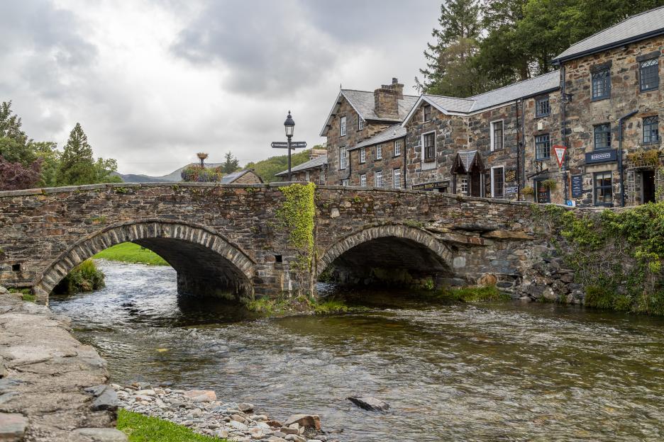 Stone bridge over a river in Beddgelert, Wales.