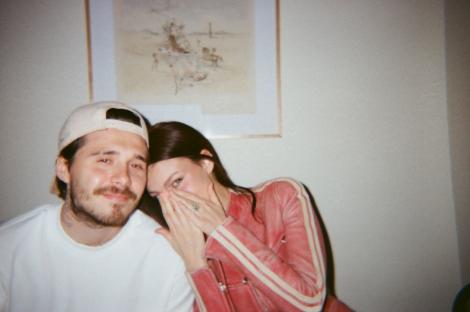 Brooklyn Beckham and Nicola Peltz at a party.