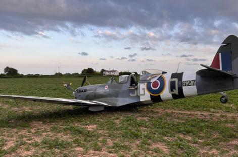 Shocking moment Spitfire ‘practising for VE Day event’ crash lands in field as bystanders left stunned