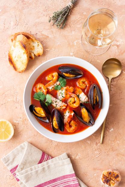 Bouillabaisse, a French seafood stew with mussels and shrimp.