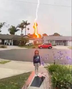 Terrifying moment lightning bolt strikes trees just metres from girl, 6, sending screaming kids scrambling for shelter