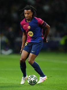 Jules Kounde of FC Barcelona dribbling the ball.