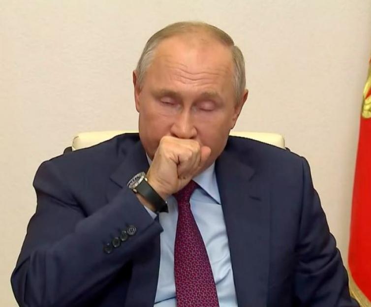 Vladimir Putin coughing.
