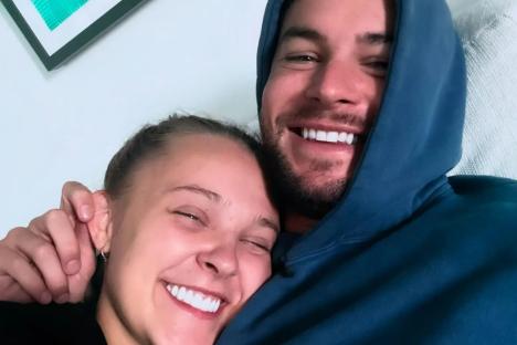First pic of JoJo Siwa and Chris Hughes KISSING in the pool on romantic adults-only holiday as relationship is confirmed