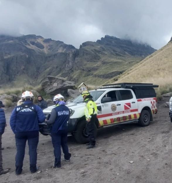 Search and rescue team near a mountain.