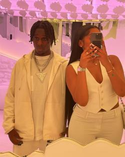 Couple posing together.