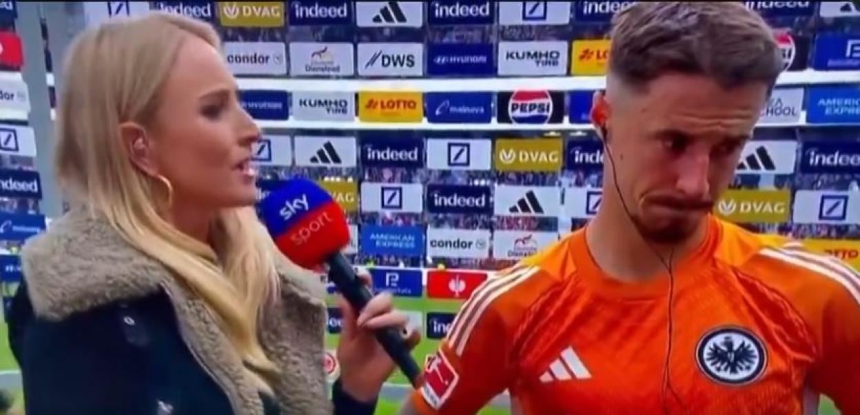 Sky Sports reporter interviewing a dejected soccer player after a 4-1 loss.