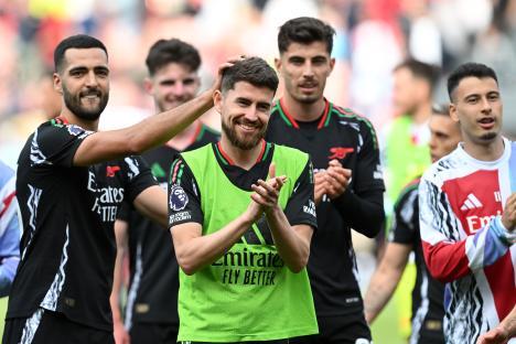 Jorginho of Arsenal applauds fans after a match.