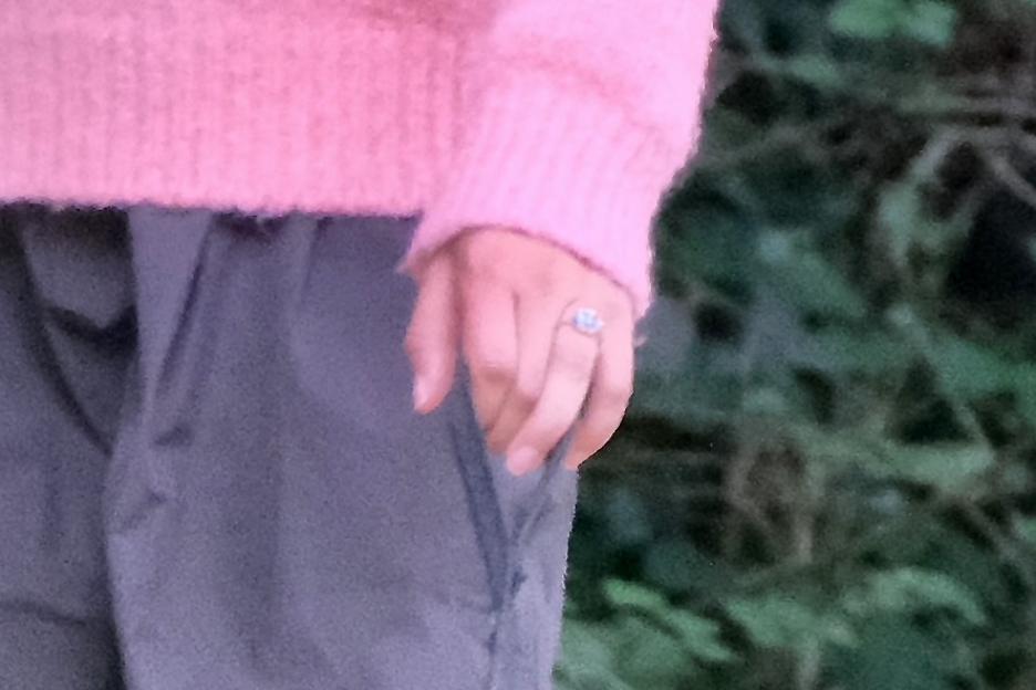 Close-up of Zendaya's hand showing an engagement ring.