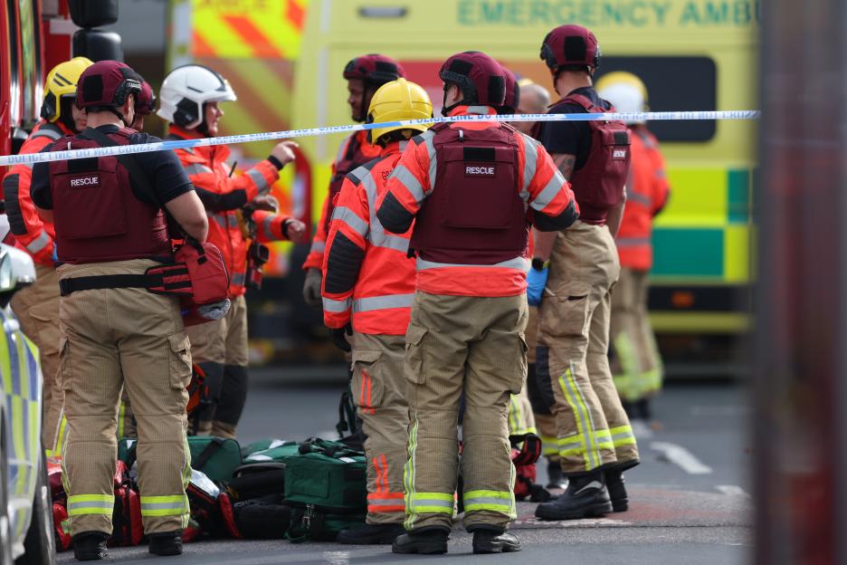 Police and first responders at the scene of a reported stabbing at a synagogue in Manchester, United Kingdom.