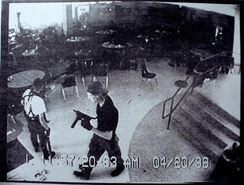 Surveillance footage of Columbine shooters Eric Harris and Dylan Klebold in the high school cafeteria.