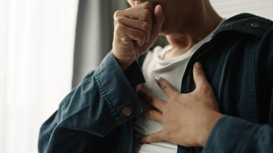 Man experiencing chest pain.