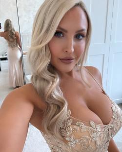 Woman in a beige sequined dress.