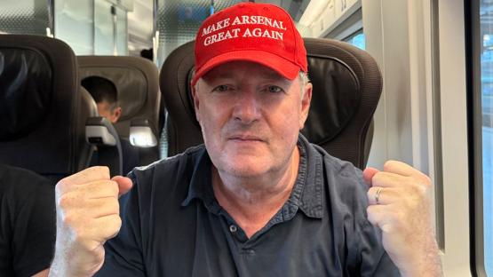 Piers Morgan wears ‘Make Arsenal Great Again’ hat as fans arrive in Paris for Champions League semi-final