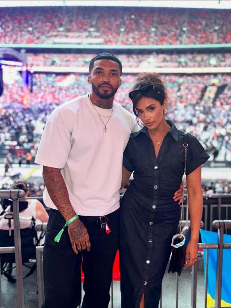 Michael and Rukku, a Love Island star and EastEnders actress, at a stadium.
