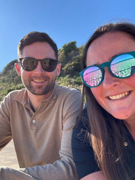 Photo of Natalie and Will at the beach.