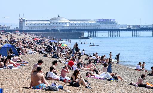 Crowds enjoying a hot day at Brighton beach.