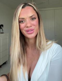 Woman with blonde hair discussing plastic surgery regrets.