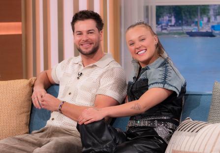 Chris Hughes and JoJo Siwa on a TV show.