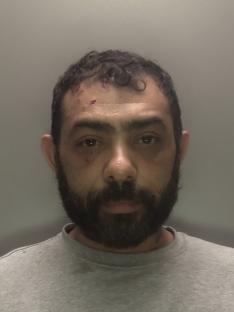 Mugshot of Costel Galoi.