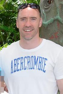 Photo of a man wearing an Abercrombie & Fitch shirt.